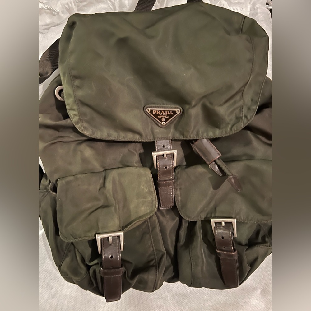 Prada back unisex moderate discoloration at base and exterior